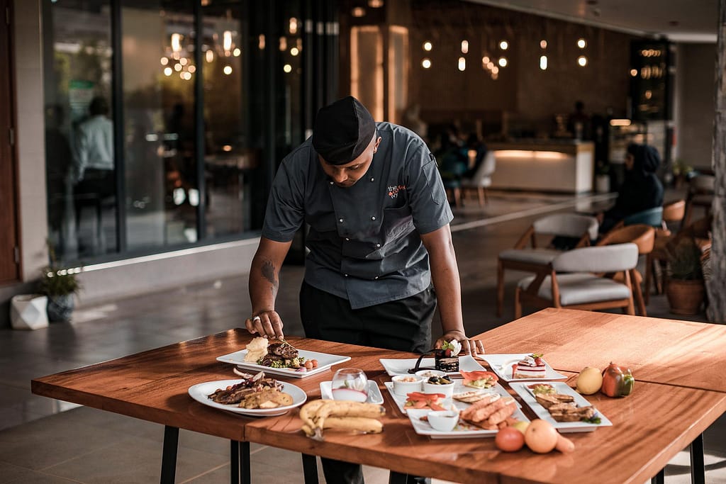 Restaurant Menu Chef at table