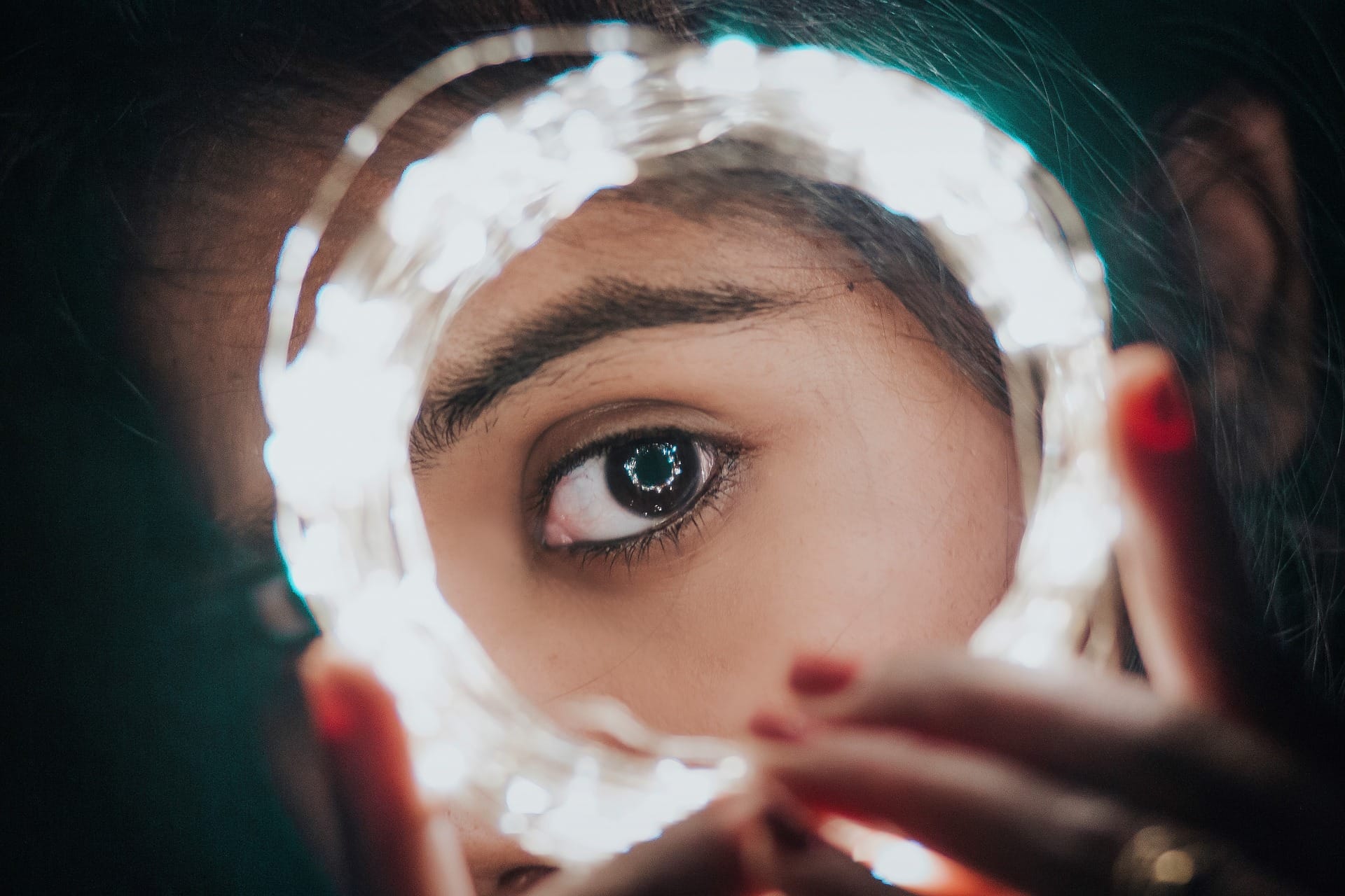 Woman with lights on her face